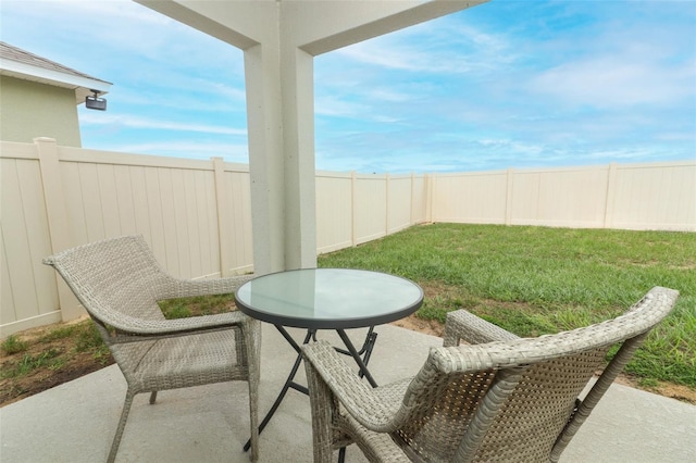 view of patio / terrace featuring a fenced backyard and outdoor dining area
