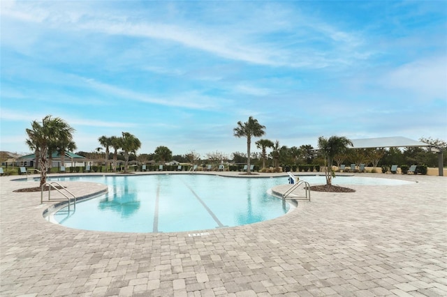 pool featuring a patio area