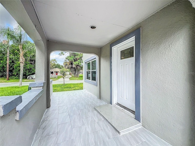 view of patio featuring covered porch