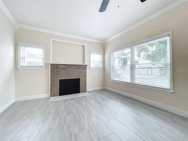 unfurnished living room with baseboards, a fireplace, crown molding, and ceiling fan