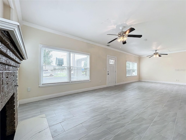 unfurnished living room featuring crown molding, baseboards, a large fireplace, visible vents, and a ceiling fan