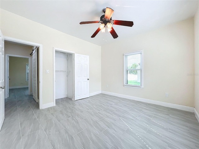 unfurnished bedroom featuring baseboards, a closet, and ceiling fan