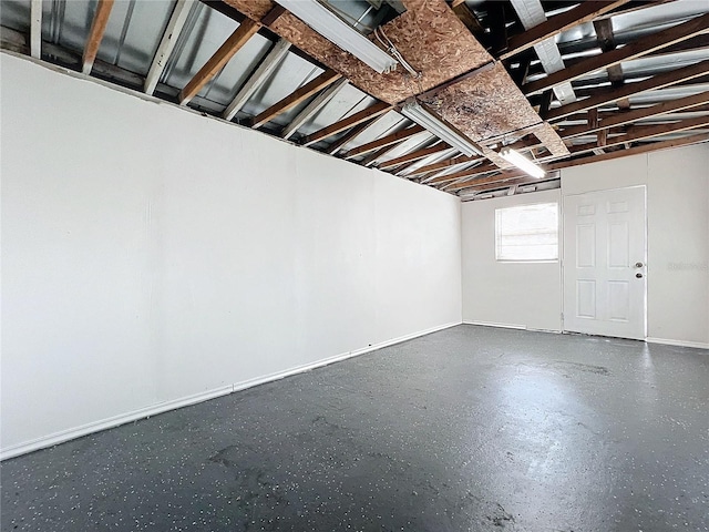 basement featuring baseboards