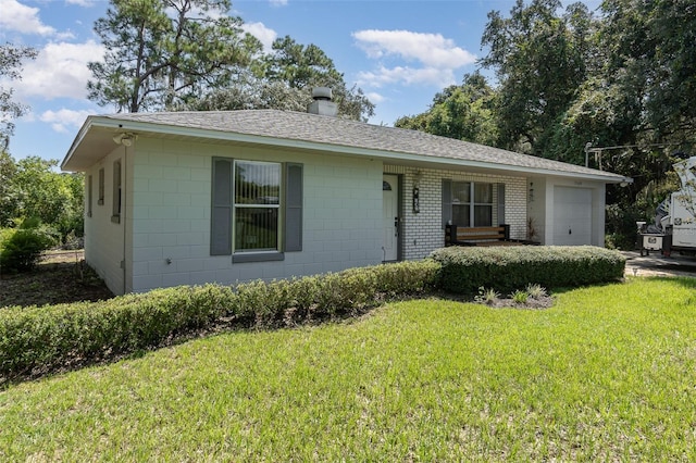 ranch-style home with a front yard