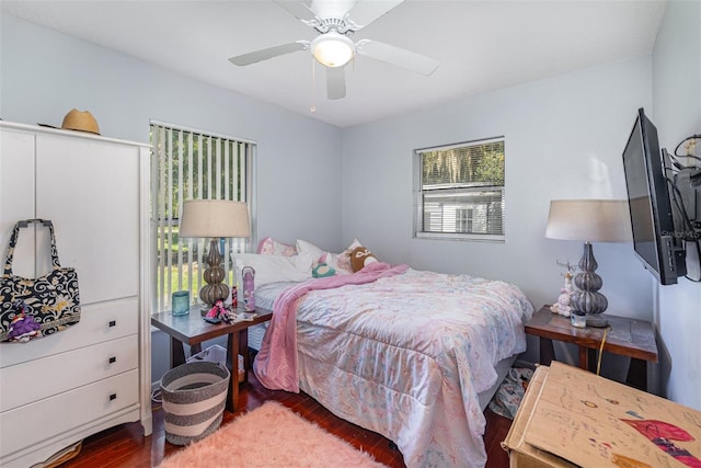 bedroom featuring wood-type flooring and ceiling fan