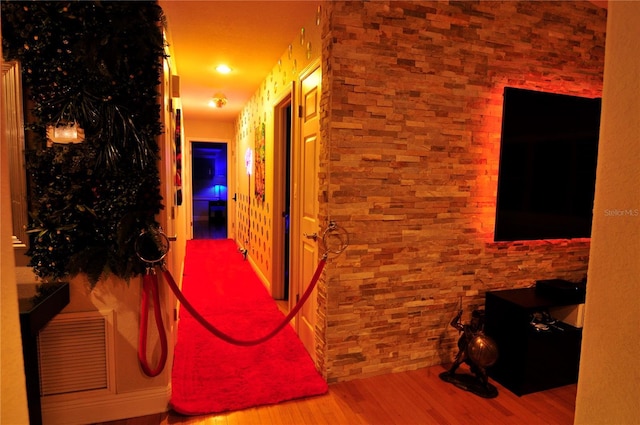 hallway featuring wood finished floors