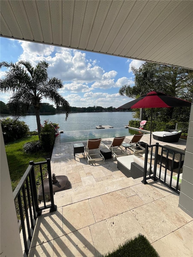 view of patio / terrace featuring a water view