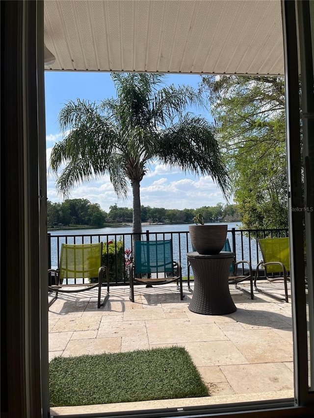 view of patio / terrace featuring a water view