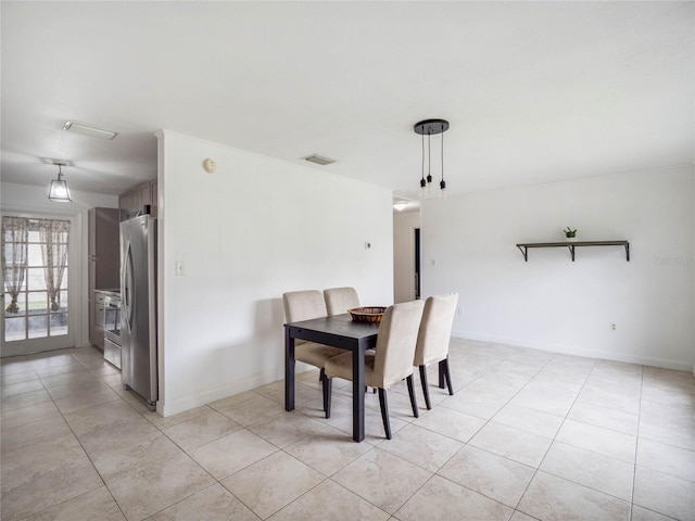 view of tiled dining space