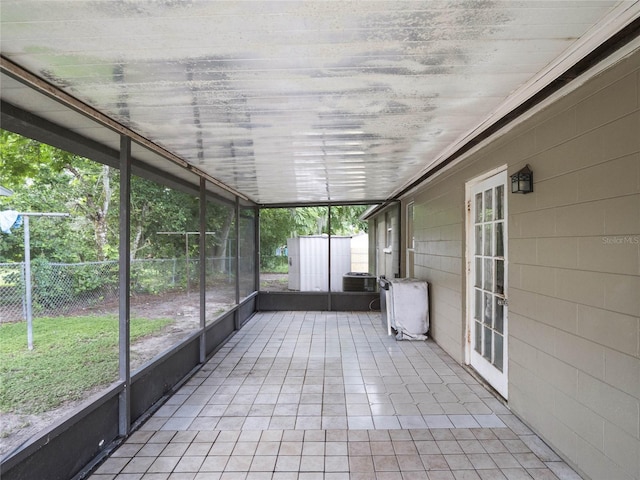 unfurnished sunroom featuring plenty of natural light