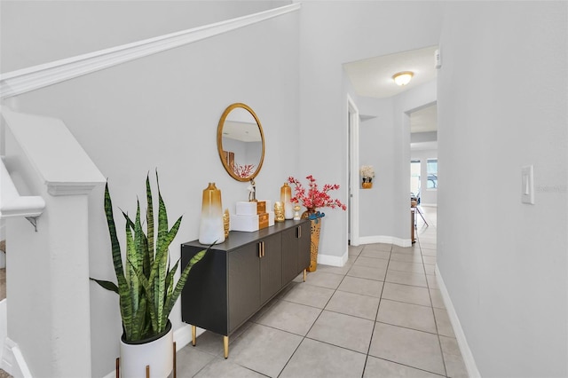 corridor featuring light tile patterned flooring