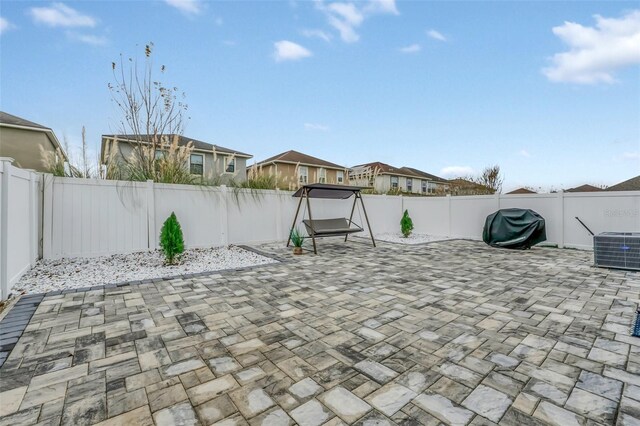 view of patio / terrace featuring area for grilling and central AC unit