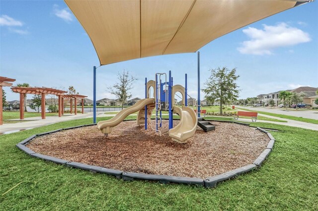 view of jungle gym with a lawn