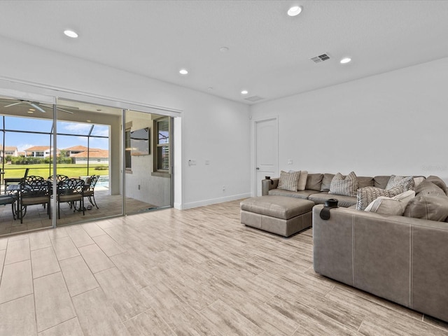 living room with light hardwood / wood-style floors