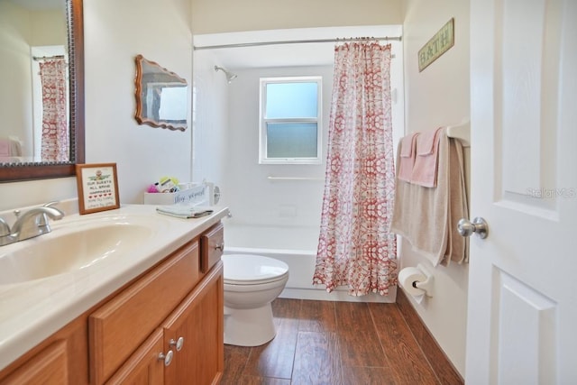 full bathroom featuring shower / bath combo, vanity, toilet, and hardwood / wood-style flooring