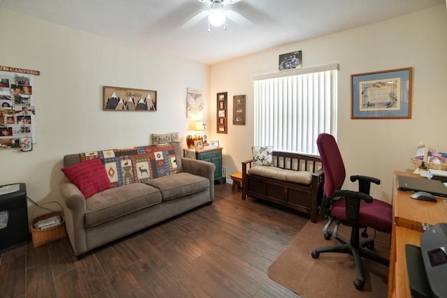 living room featuring dark hardwood / wood-style flooring and ceiling fan