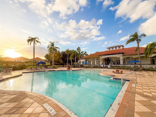 view of swimming pool featuring a patio area