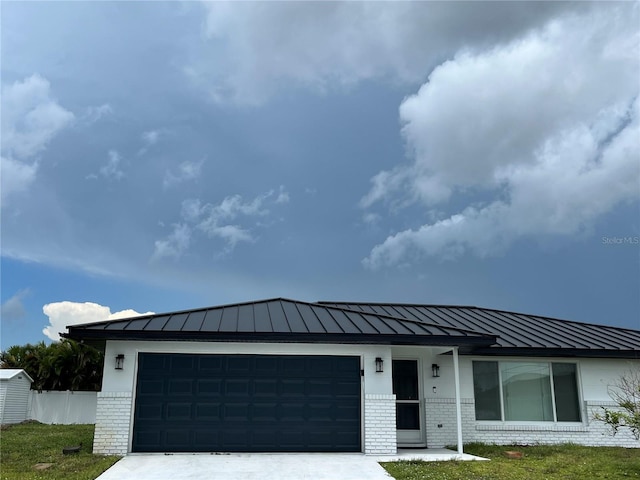 view of front of house with a garage