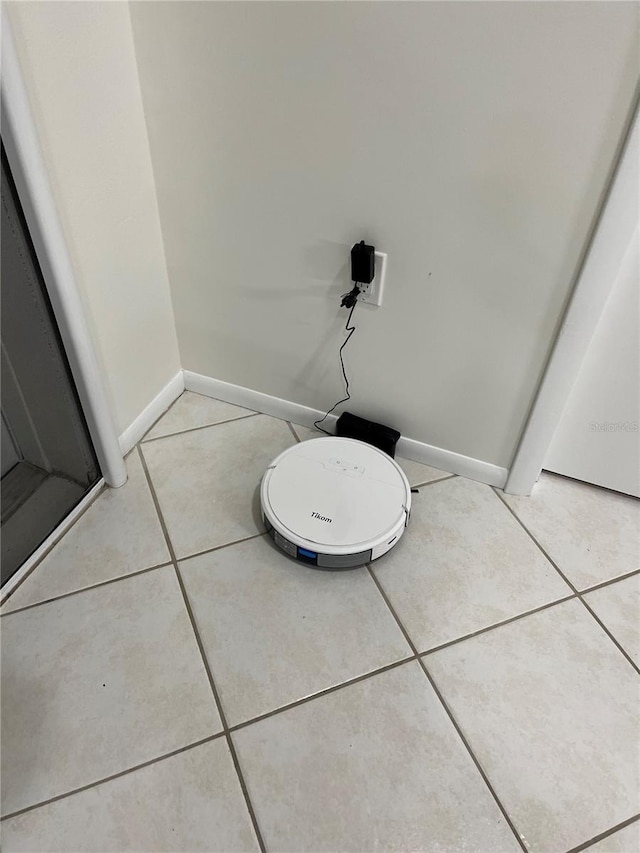 bathroom with tile patterned flooring