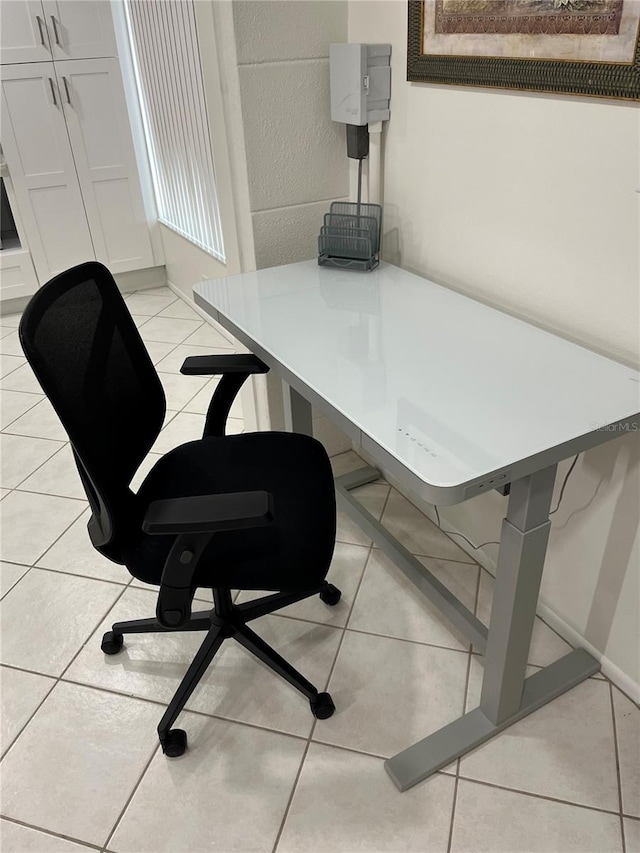 office with light tile patterned floors