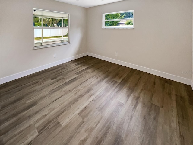 spare room featuring hardwood / wood-style flooring