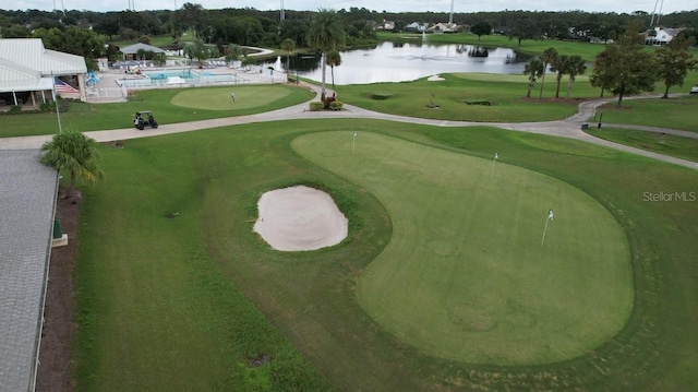 surrounding community with a water view