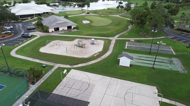 bird's eye view with a water view