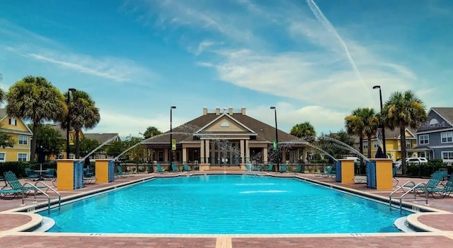 view of swimming pool with a patio