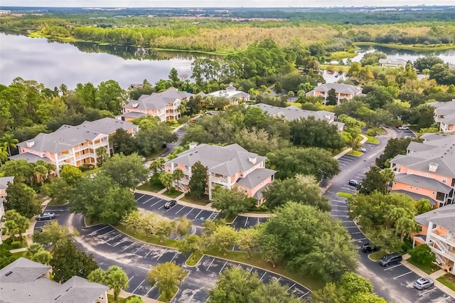 drone / aerial view with a water view