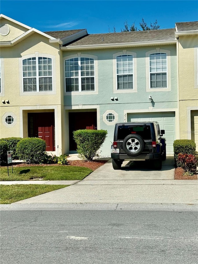 view of property featuring a garage