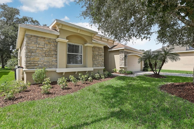 ranch-style house with a garage and a front lawn