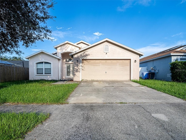 single story home featuring a garage