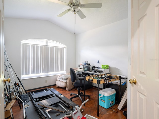 office with dark hardwood / wood-style floors, ceiling fan, and vaulted ceiling