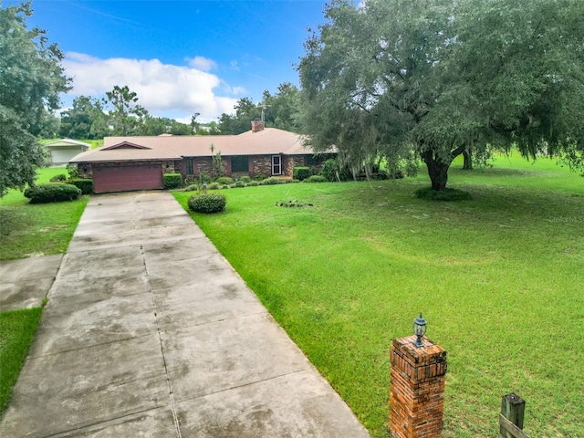 view of yard featuring a garage