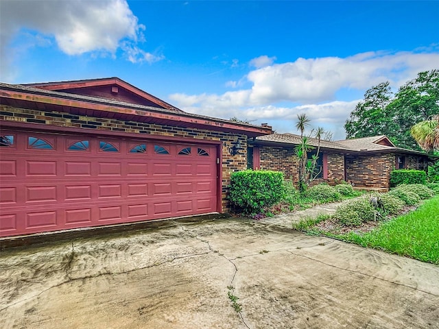 exterior space with a garage