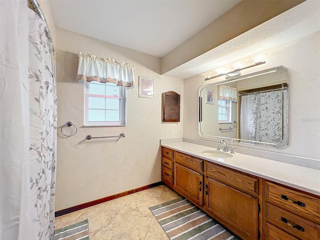 bathroom featuring vanity and tile patterned floors