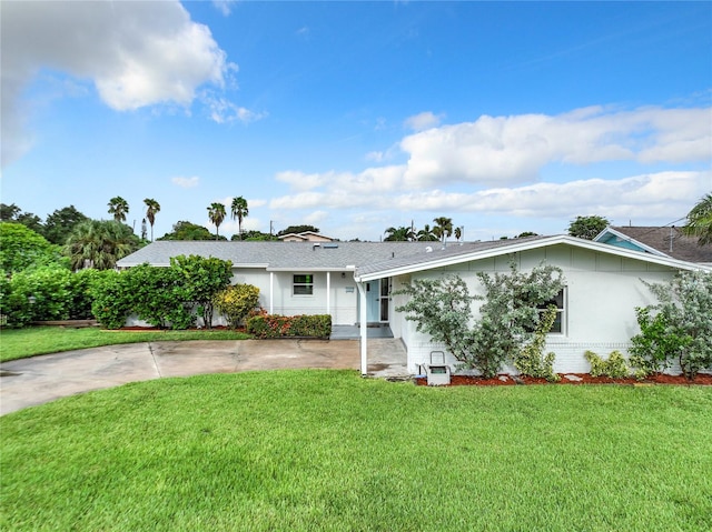 single story home with a front yard