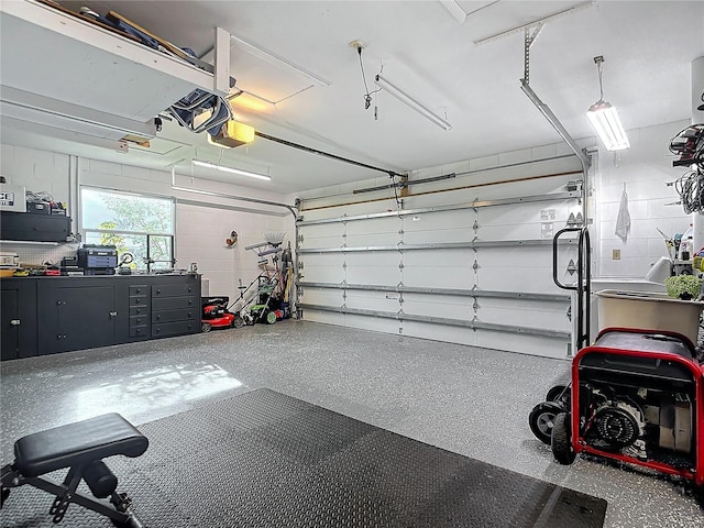 garage featuring a garage door opener