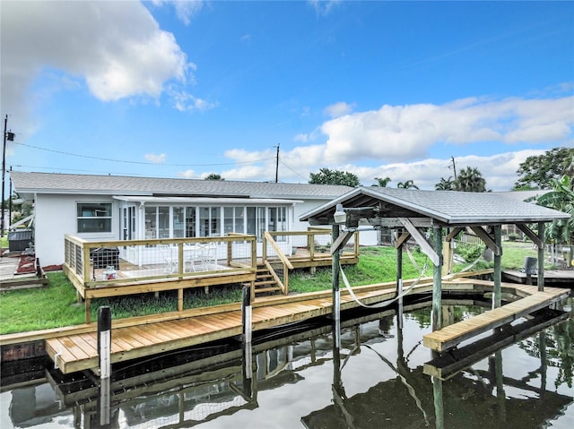 dock area with a deck with water view