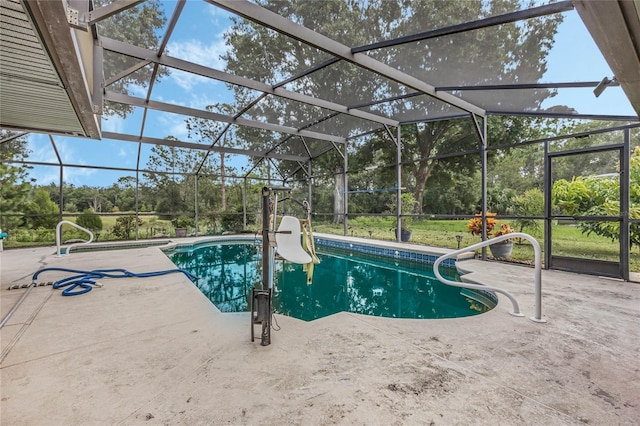 view of pool with a patio and a lanai