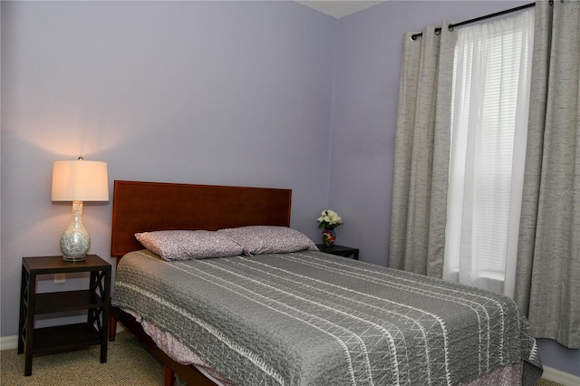 bedroom featuring carpet flooring