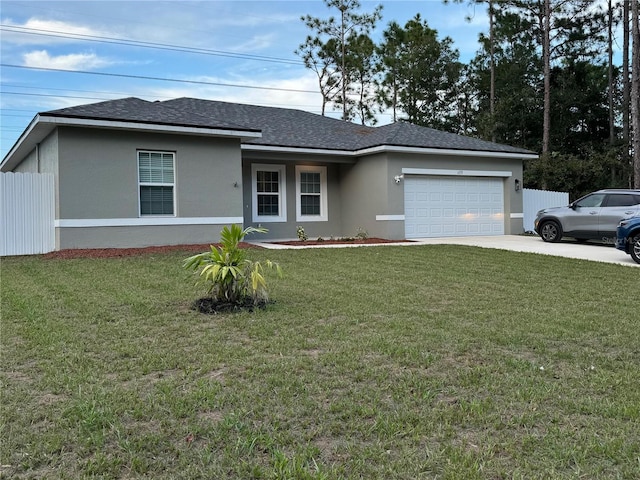 single story home with a garage and a front lawn