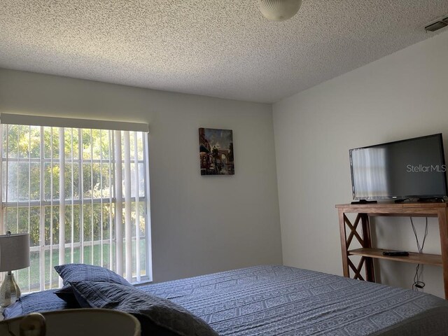 bedroom with a textured ceiling