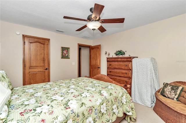 bedroom with ceiling fan and carpet