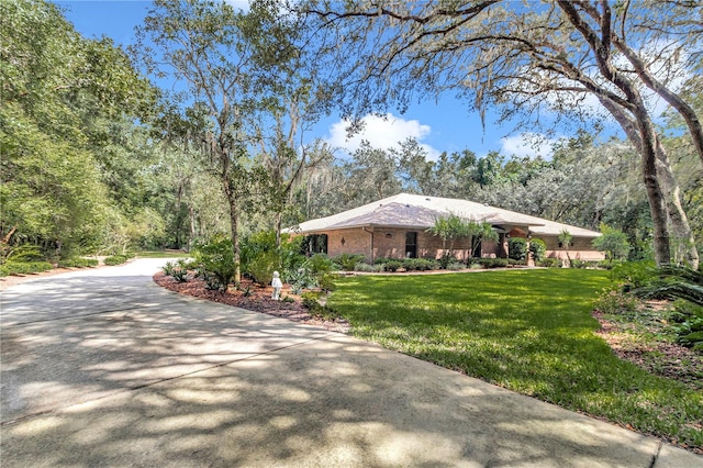 view of front of home with a front lawn