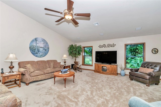 living room featuring carpet flooring, ceiling fan, and lofted ceiling