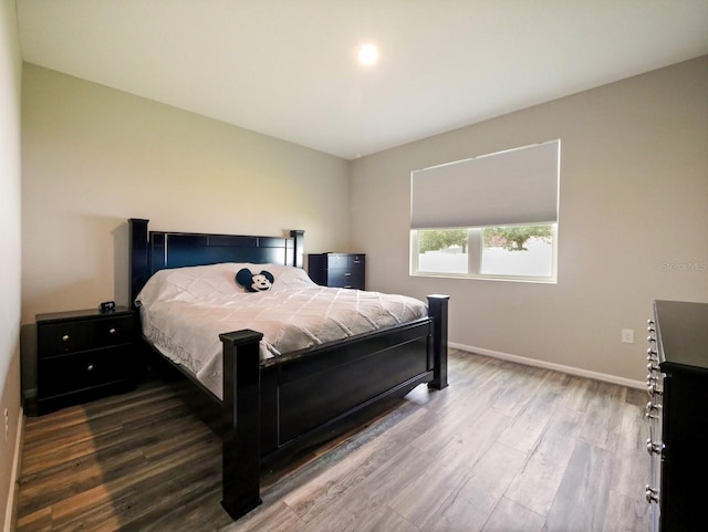 bedroom featuring dark hardwood / wood-style floors