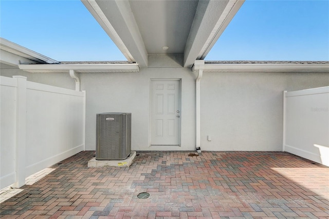 entrance to property with central AC unit