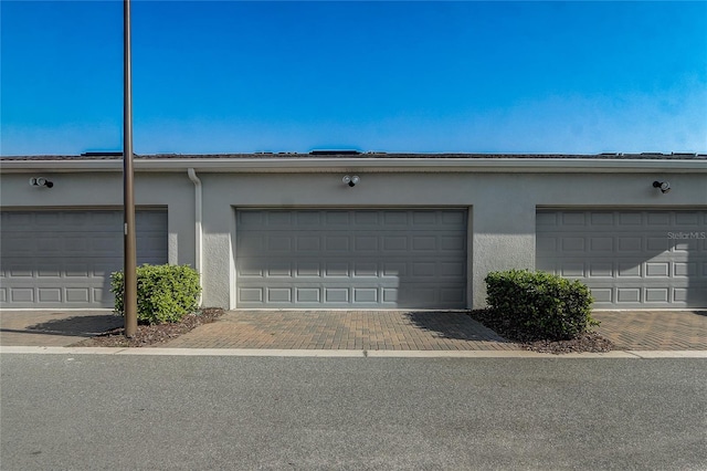 exterior space with a garage