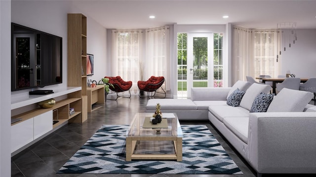 living room featuring dark tile patterned floors and plenty of natural light